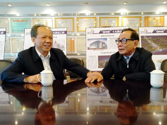 郭文海探望著名建筑设计师梁昆浩